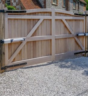 automatic wooden gate - Big Easy Fences
